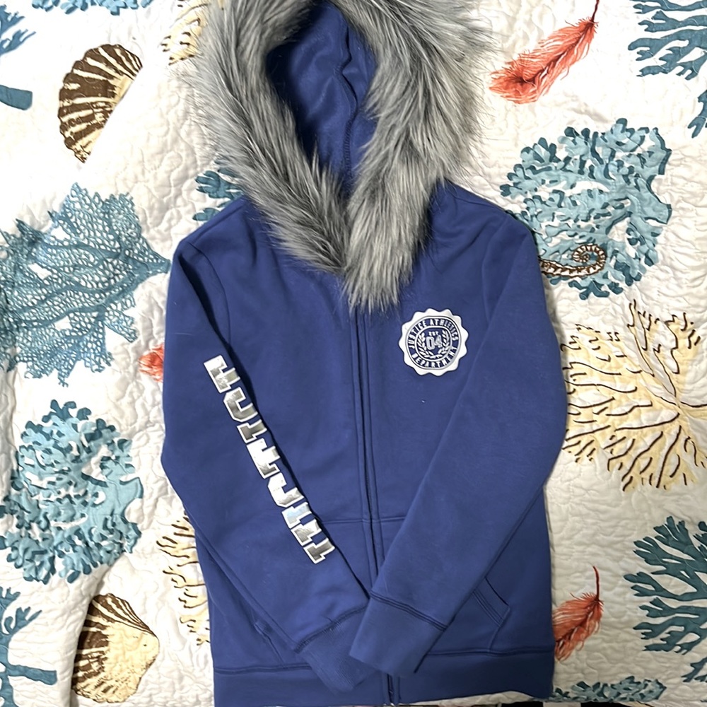 Justice kids size 8 fur lined hooded sweatshirt.